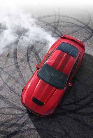 Overhead view of a 2024 Ford Mustang® model with tire tracks on pavement | Bergstrom Ford of Oshkosh in Oshkosh WI