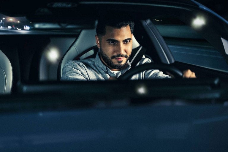 Person sitting in the driver’s seat of a parked 2024 Ford Mustang® coupe | Bergstrom Ford of Oshkosh in Oshkosh WI